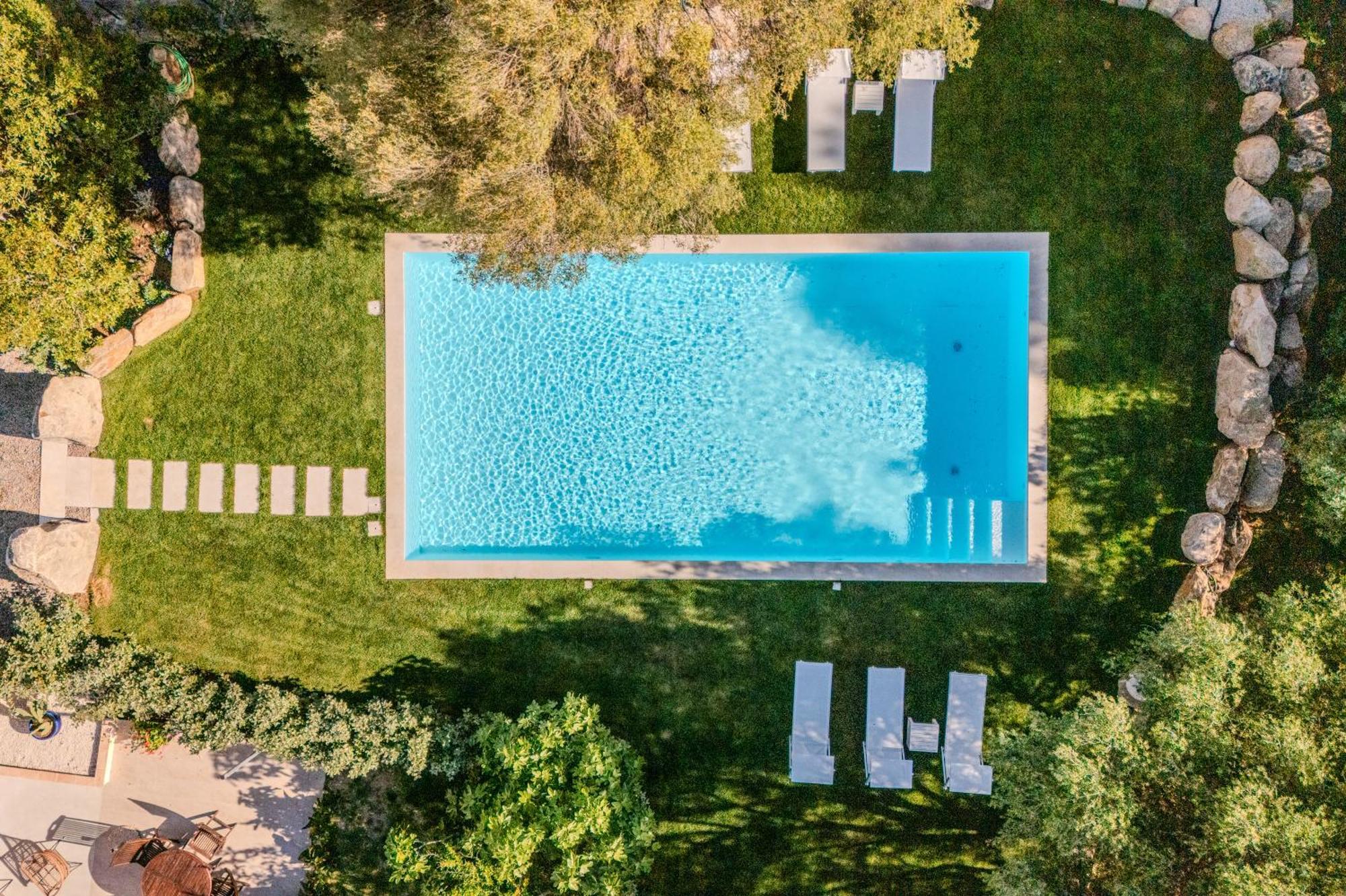 Stazzo San Teodoro La Quercia Piscina Condivisaアパートメント エクステリア 写真